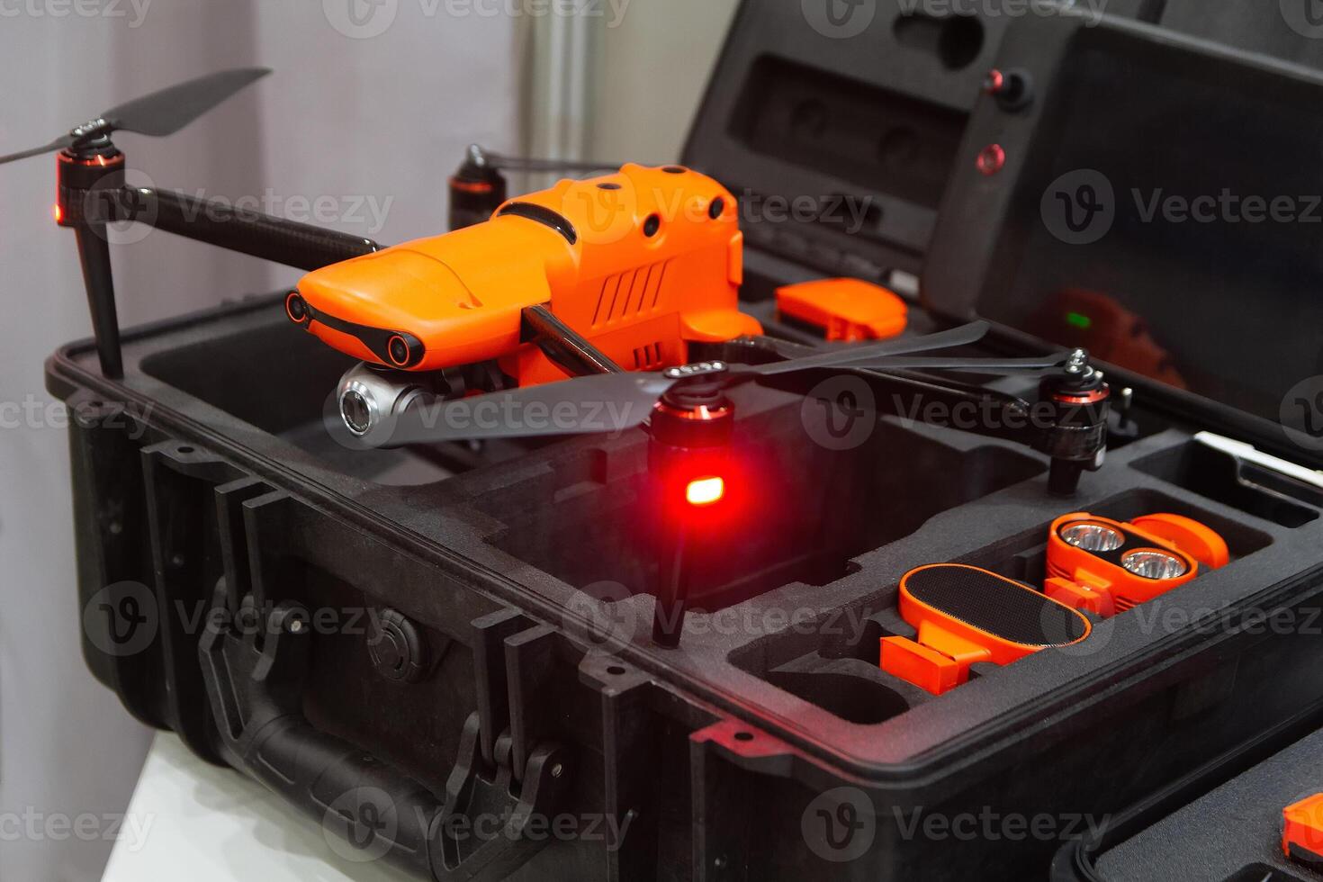 A drone with a camera in a box on a store photo