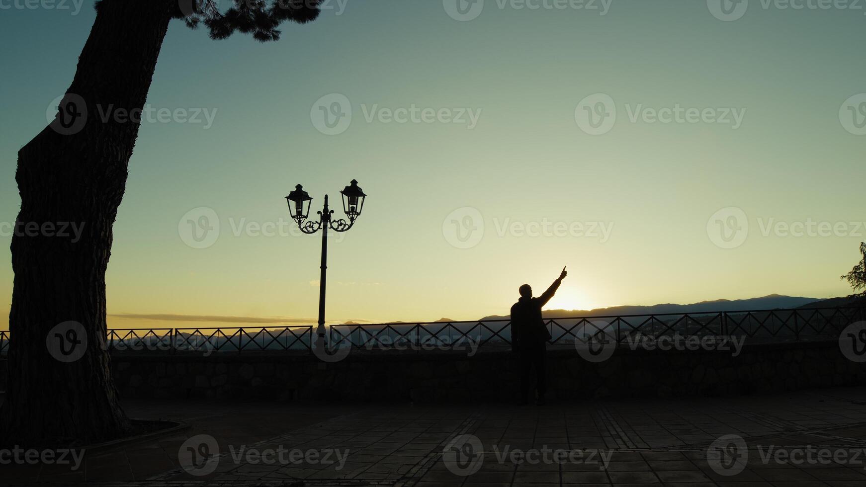 Silhouette Of A Man Indicates The Places Visible Overlooking The Sunset Outdoor photo