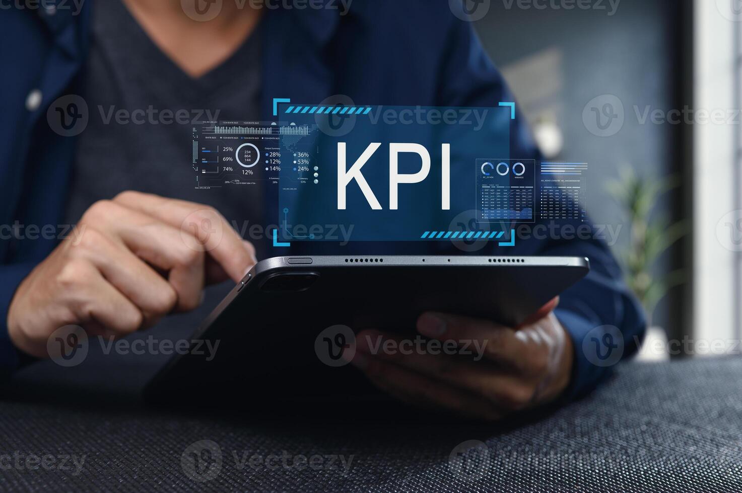 Analyzing Key Performance Indicators on a Tablet Device photo