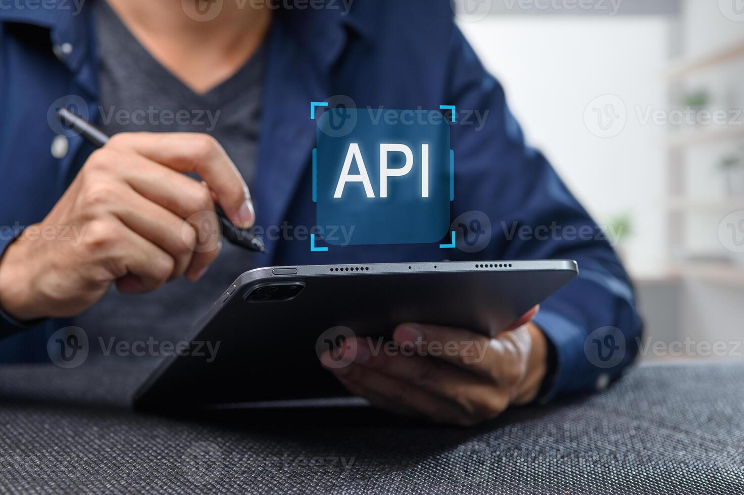 Person Developing Application Programming Interface on Tablet Device photo