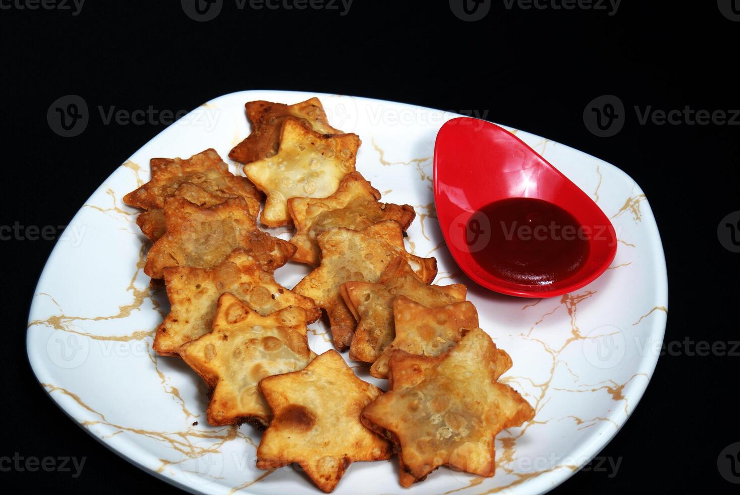 Flaky and Golden Aloo Puffs with Zesty Tomato Sauce - A Must-Have for Elegant Gatherings photo