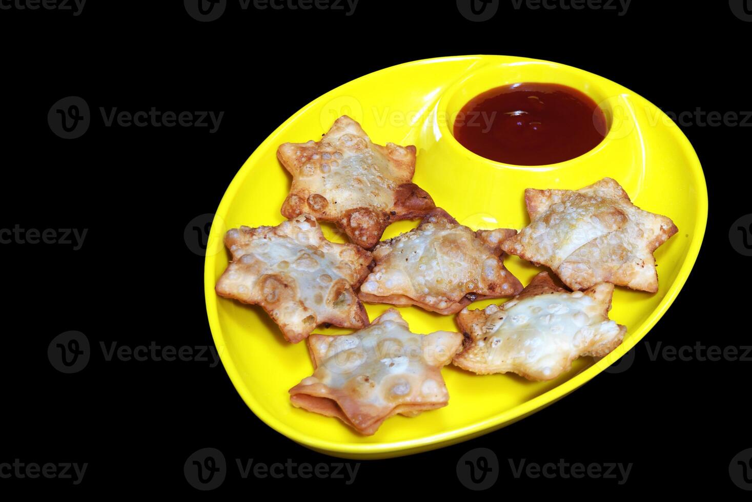 Flaky Star-Shaped Aloo Puff Pastry with Bold Tomato Dip on Sleek Black Marble - A Gourmet Delight for Festive Gatherings photo