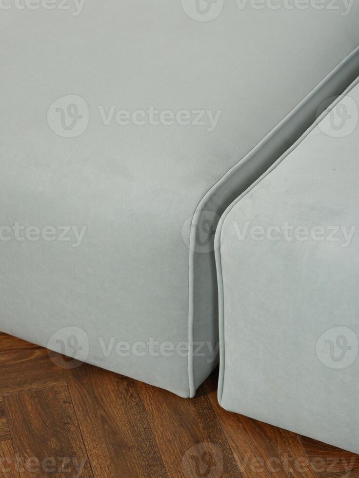 This is a Modern Soft Couch Corner designed using Light Blue Fabric, perfect for style and comfort photo