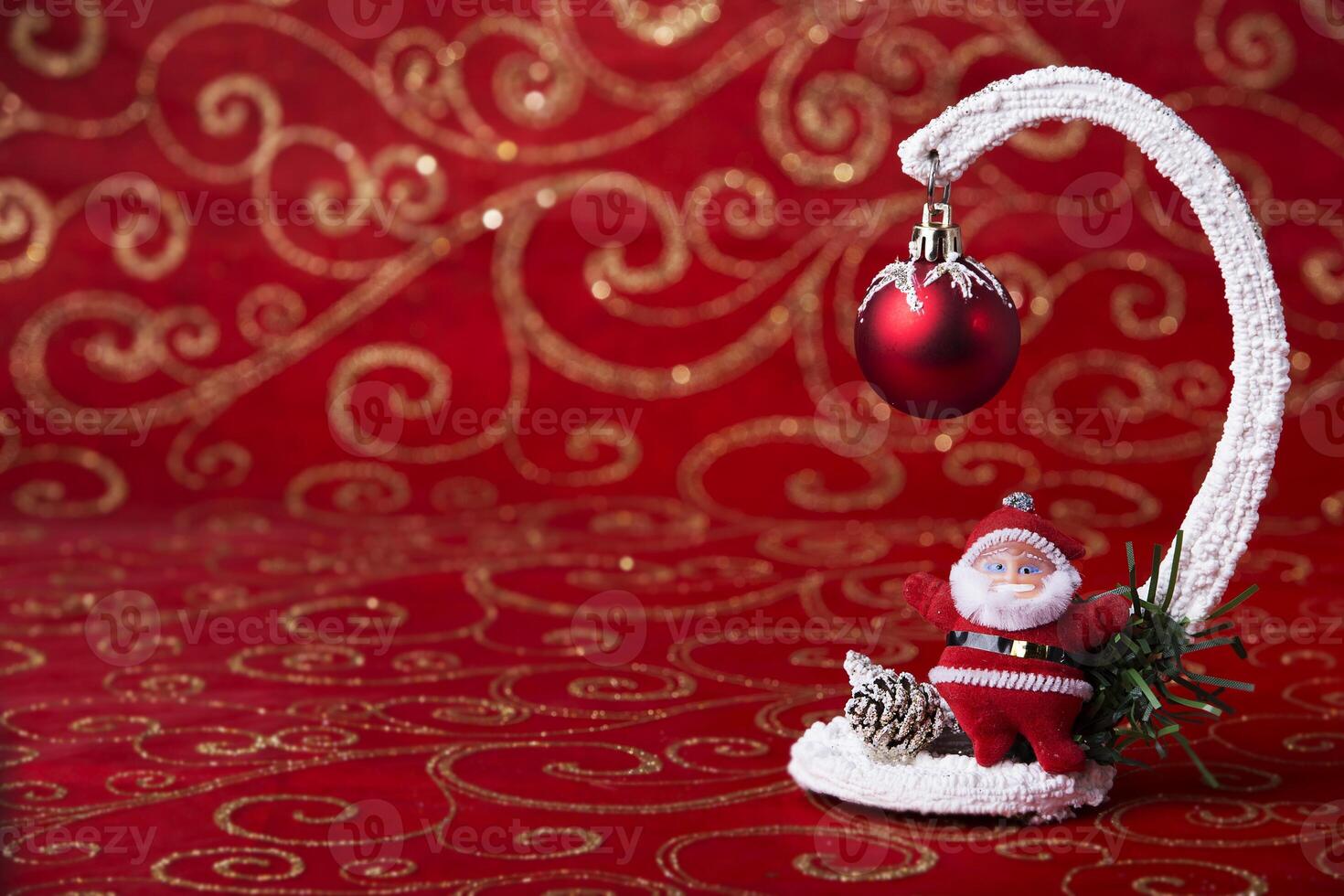 New Year card. Toy Santa Claus. A toy ball for a Christmas tree. Decoration for the holiday. photo