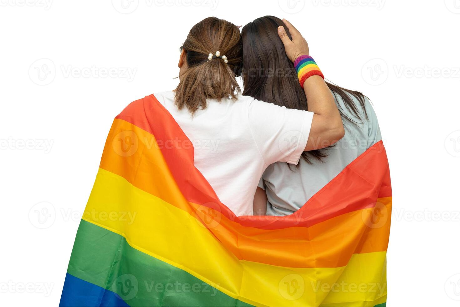 couple woman with LGBT rainbow flag isolated on white background. photo