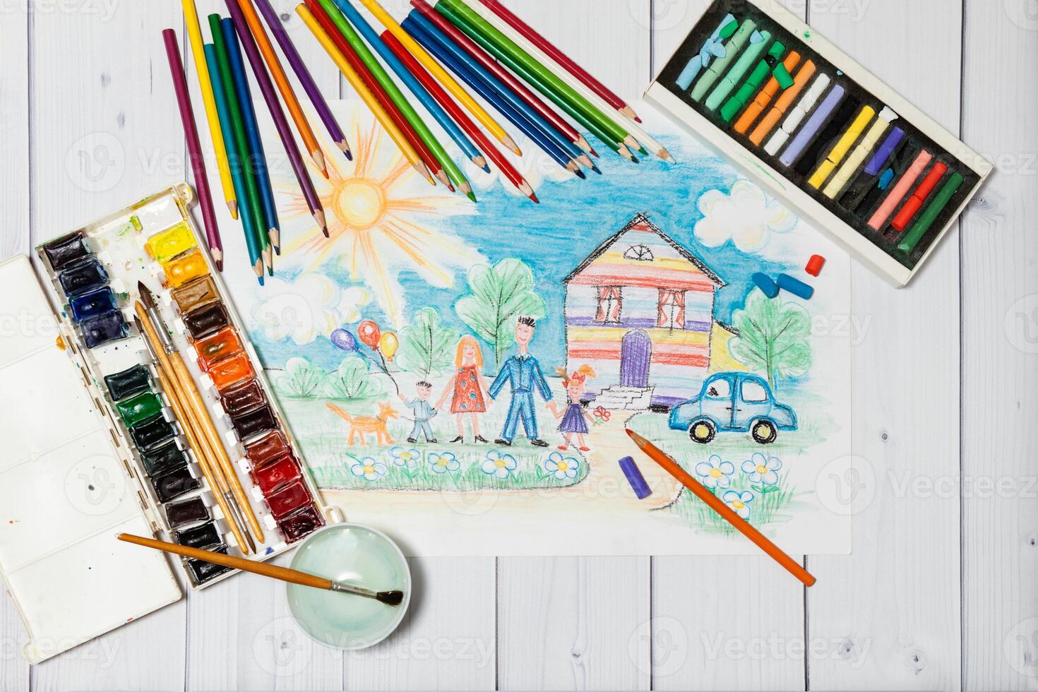 Childrens Creation With Sketch of Family And Paints photo