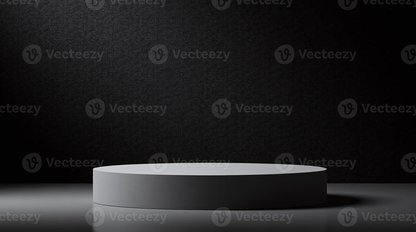 A sleek black pedestal against a textured wall. photo