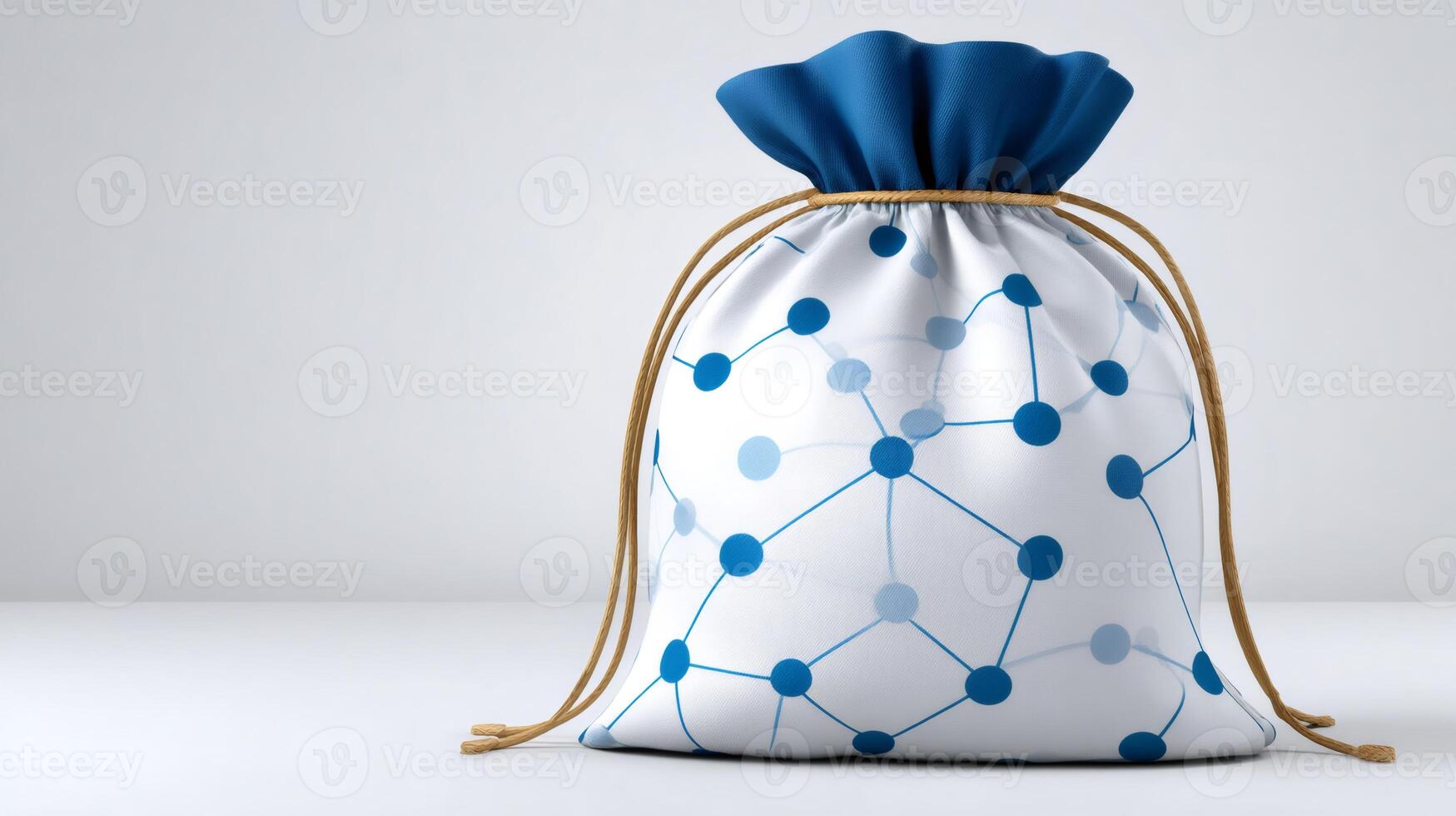 White bag with blue network pattern and rope closure standing on white background photo