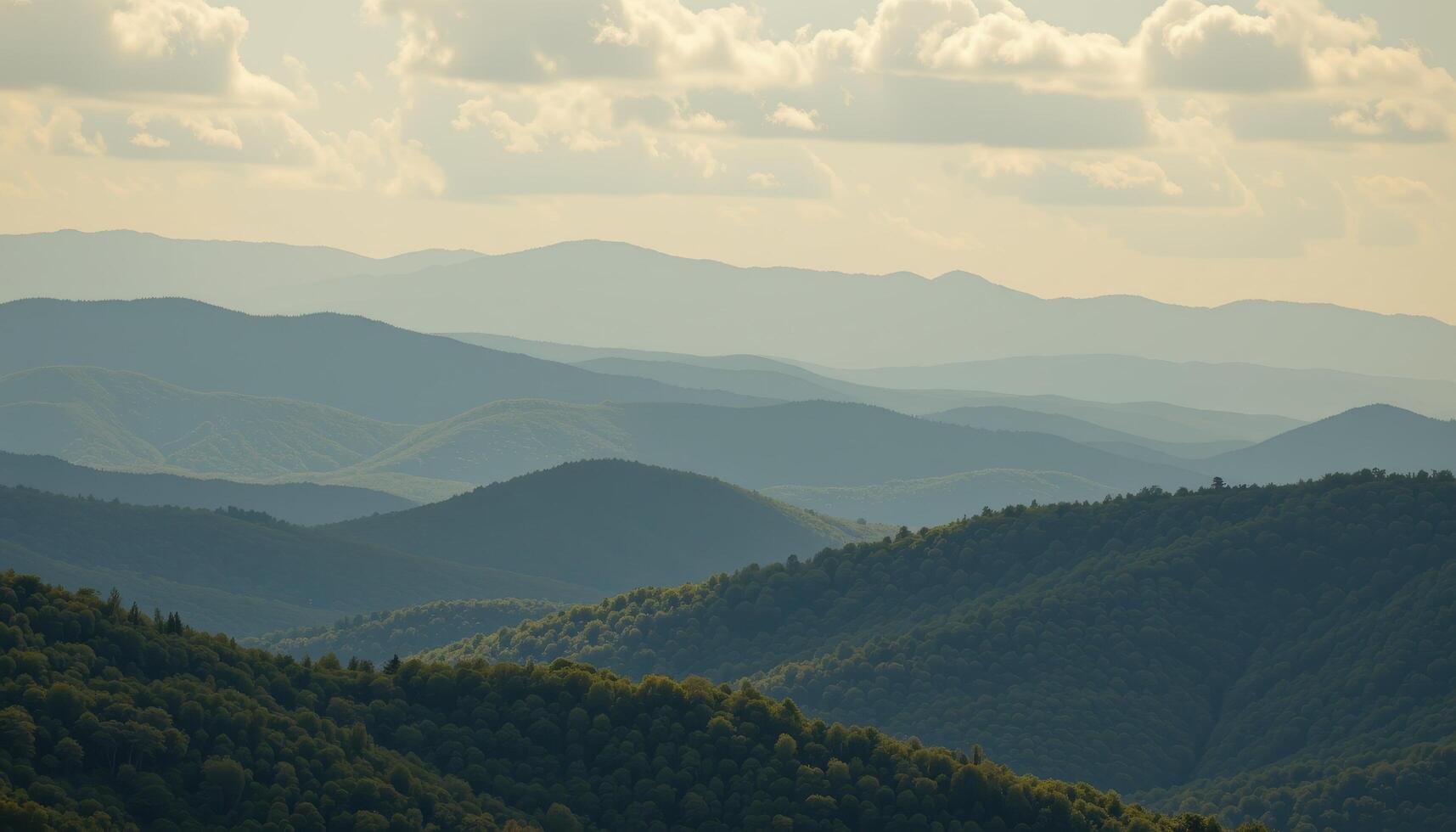 a distant view of rolling jungle covered hills. photo