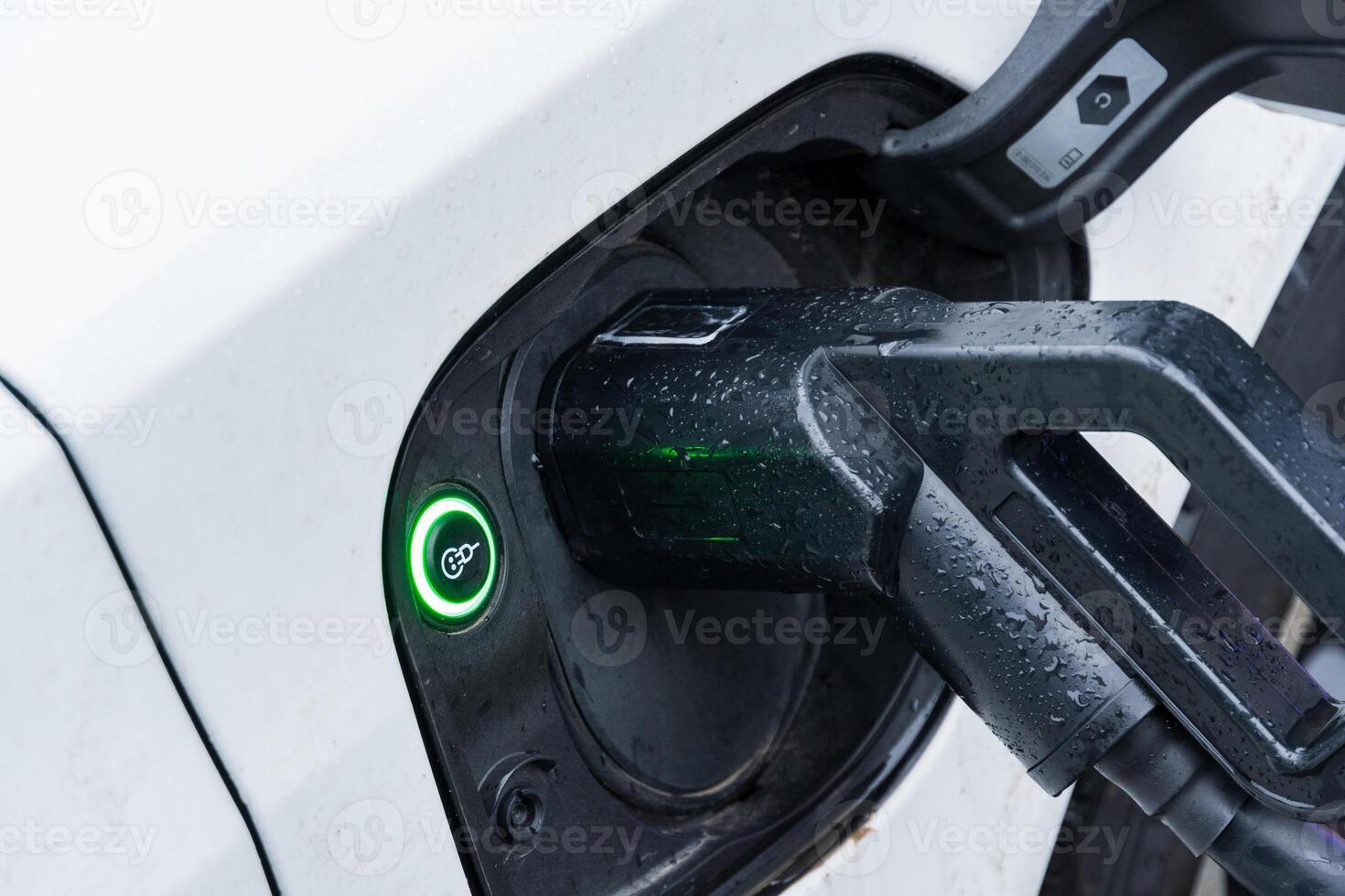 Electric car charging shows the shift to eco-friendly transport in cities, blending technology with sustainability photo