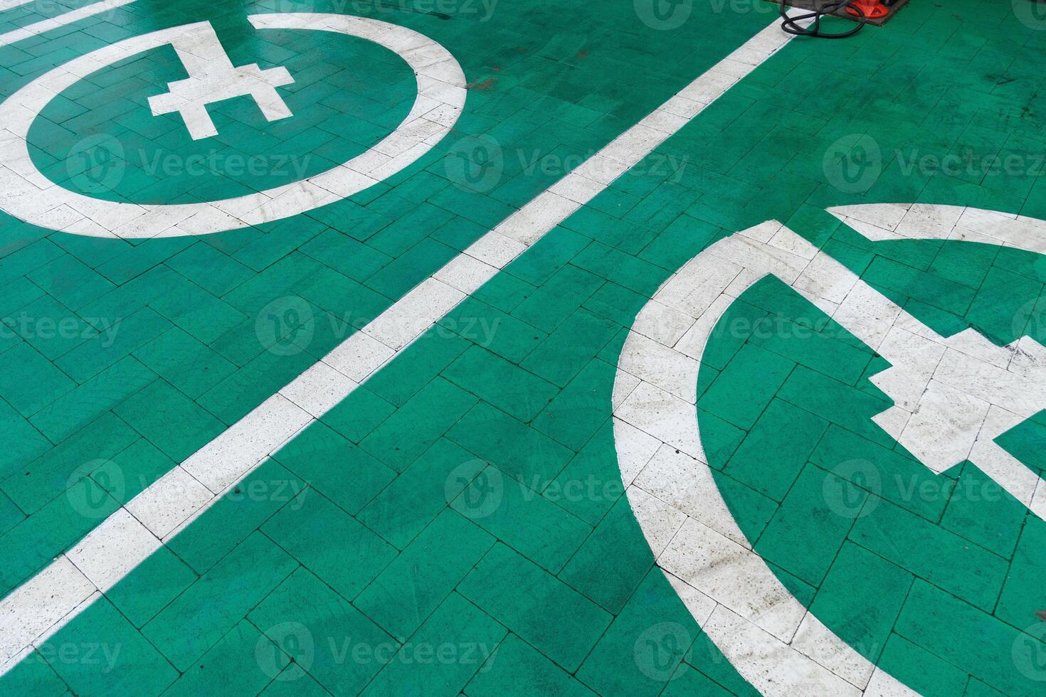 Brightly colored charging spots are marked for electric vehicles, showcasing a commitment to sustainable transportation and advanced technology photo