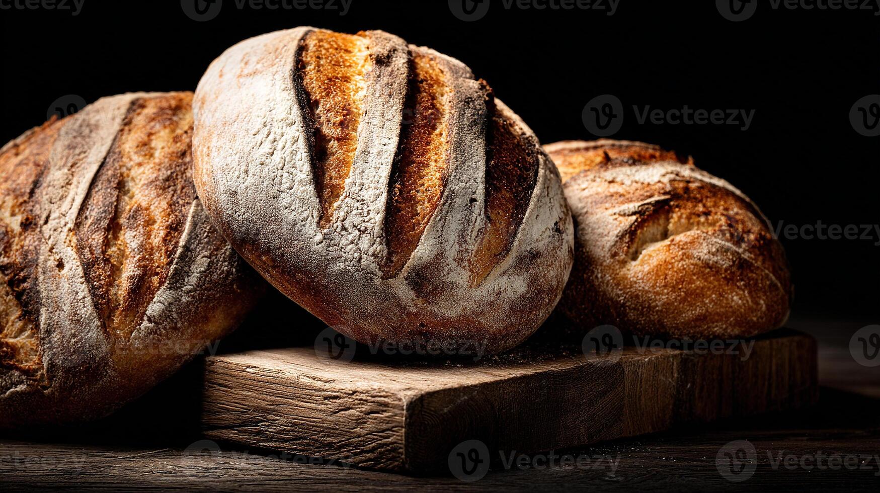 Bread loaf in morning sunlight on board photography photo