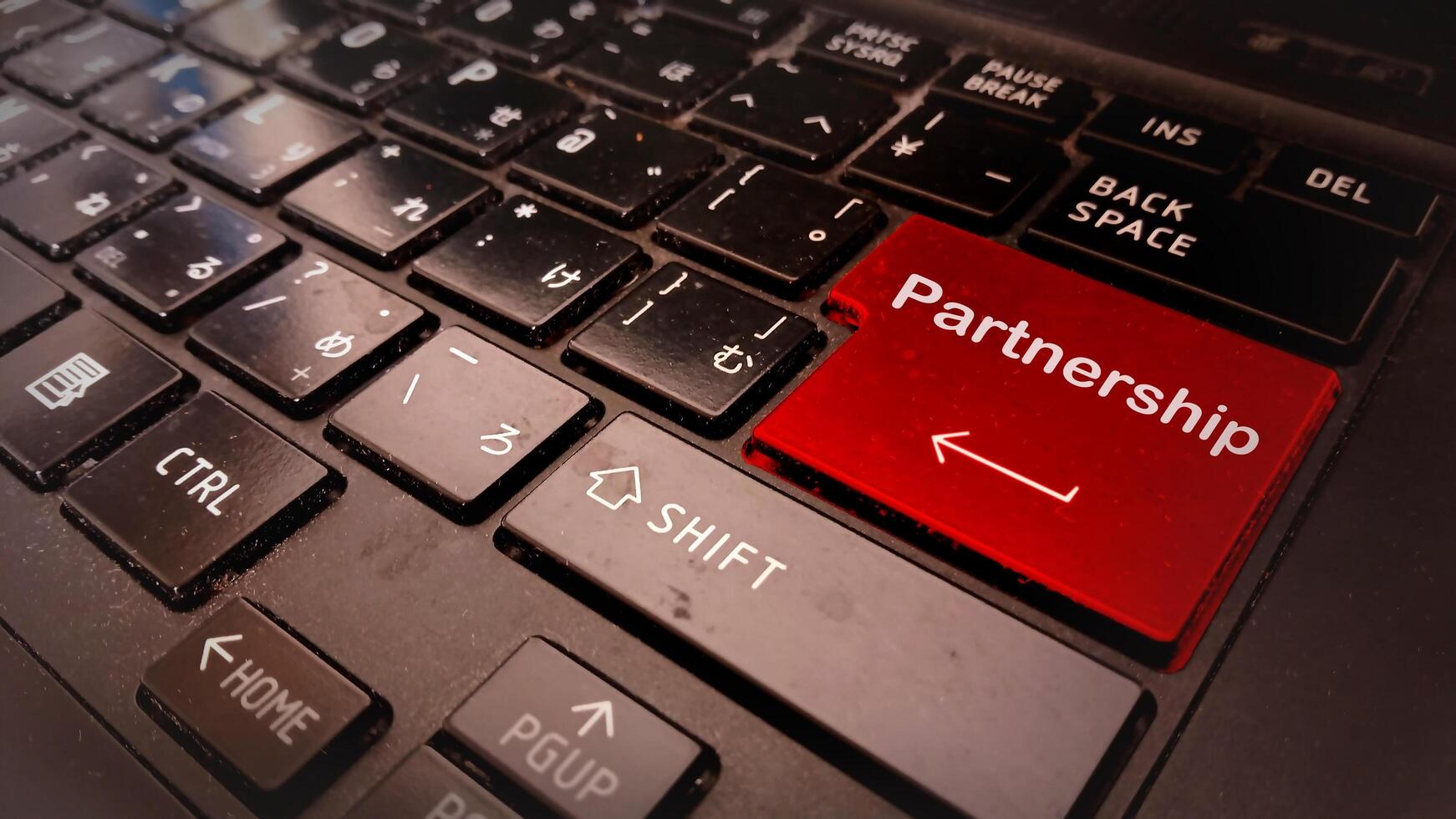 The partnership key on a laptop keyboard photo