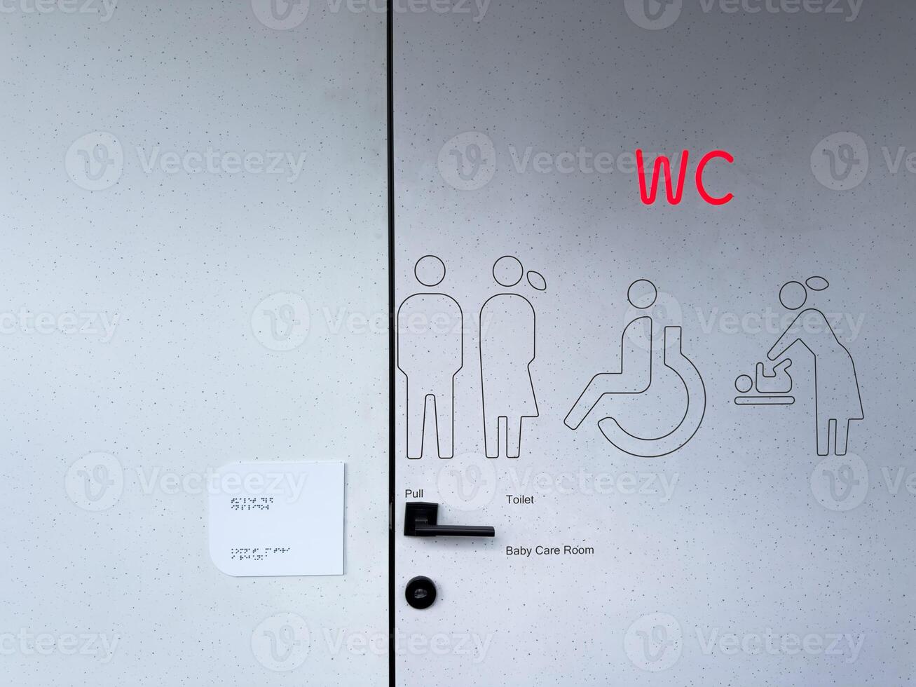 Modern public restroom door with illuminated WC sign, inclusive pictograms for men, women, disabled persons, and baby care. Accessible and universal design in public infrastructure photo