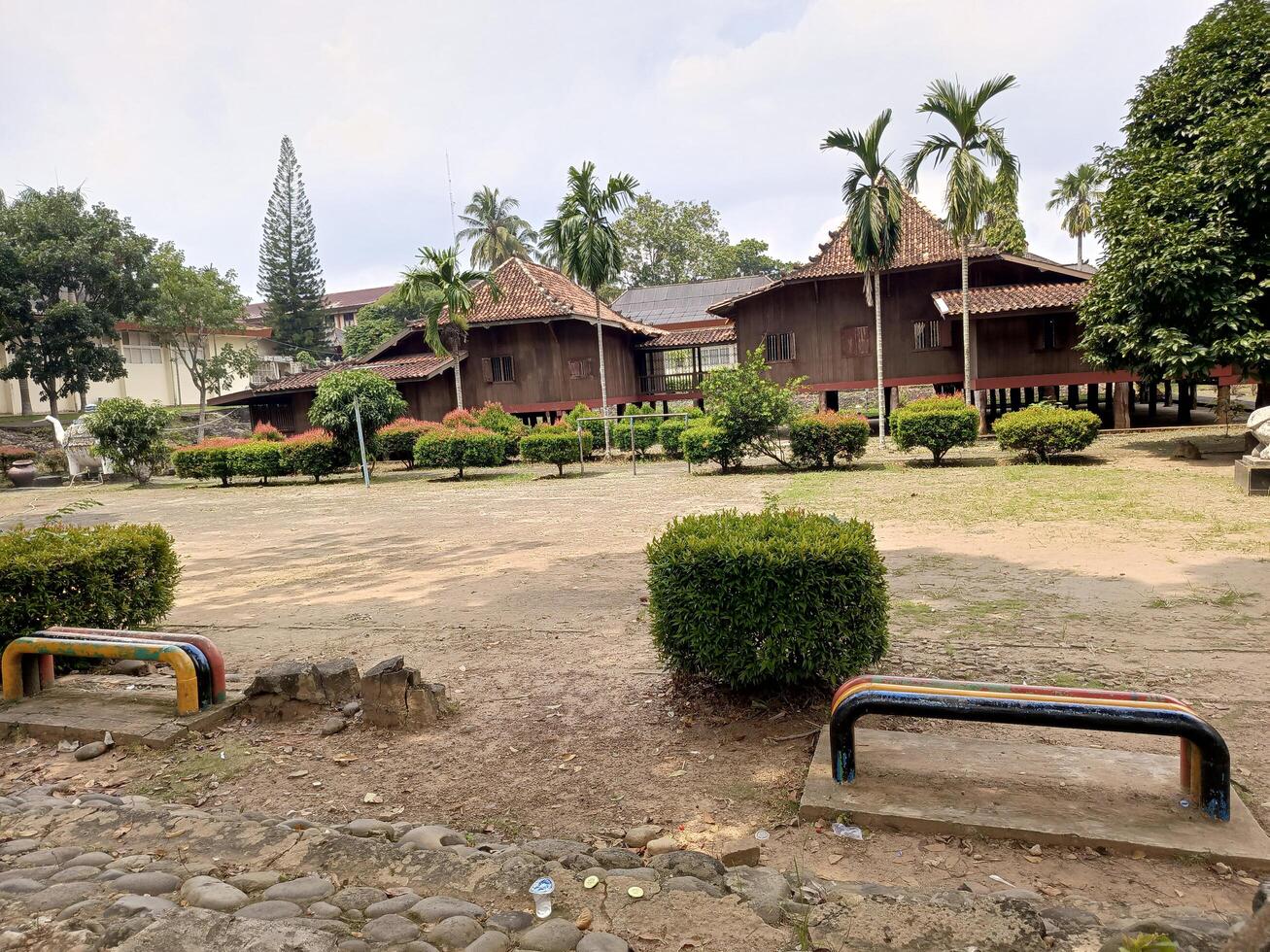 Traditional Brown House on Stilts in Outdoor Cultural Park Setti photo