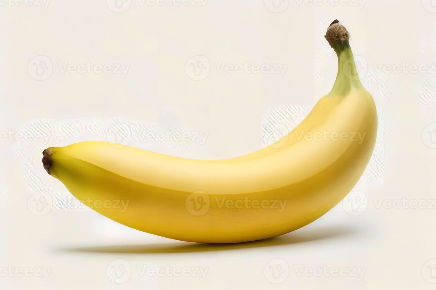 A banana is shown on a white background photo