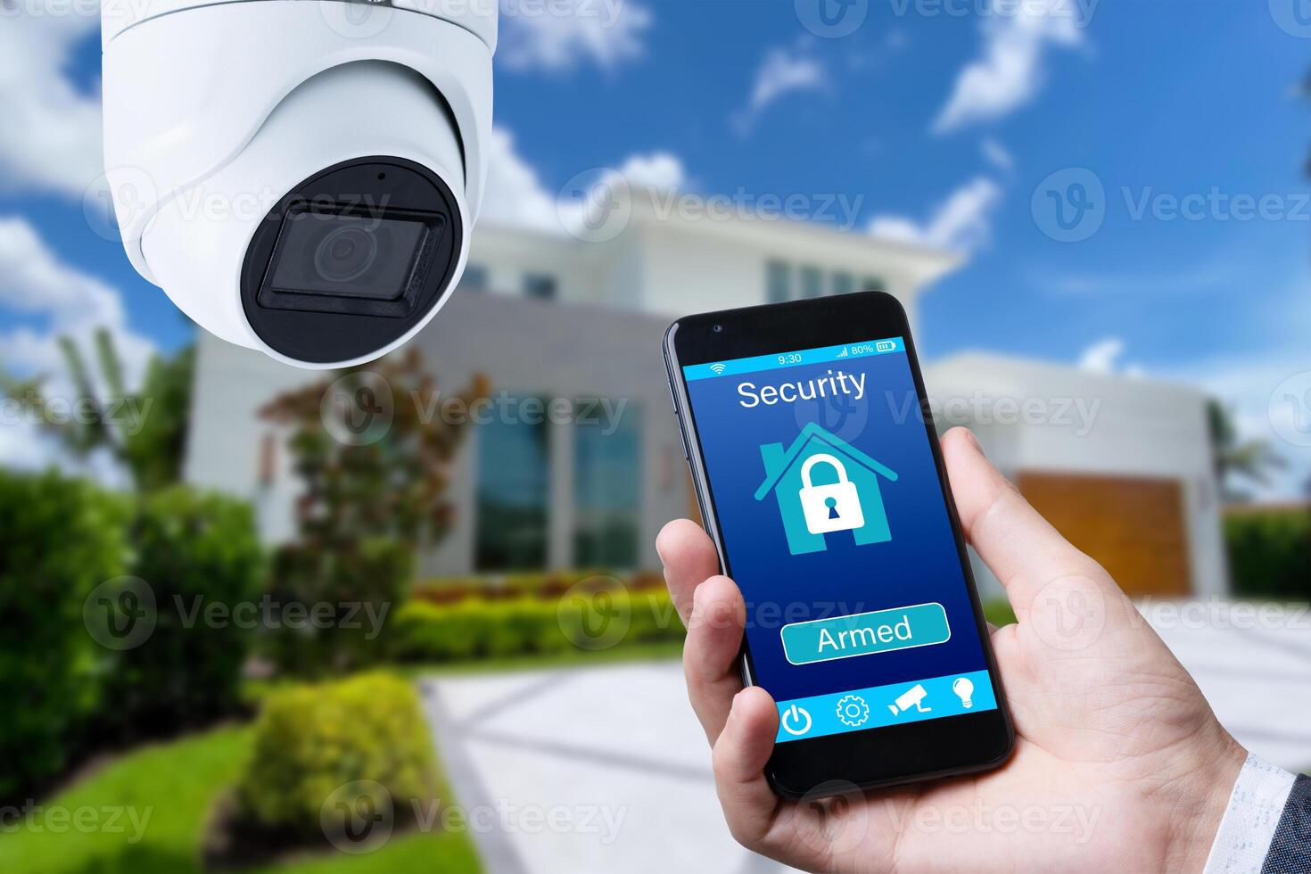 Security camera and smart home app, private house on the background photo