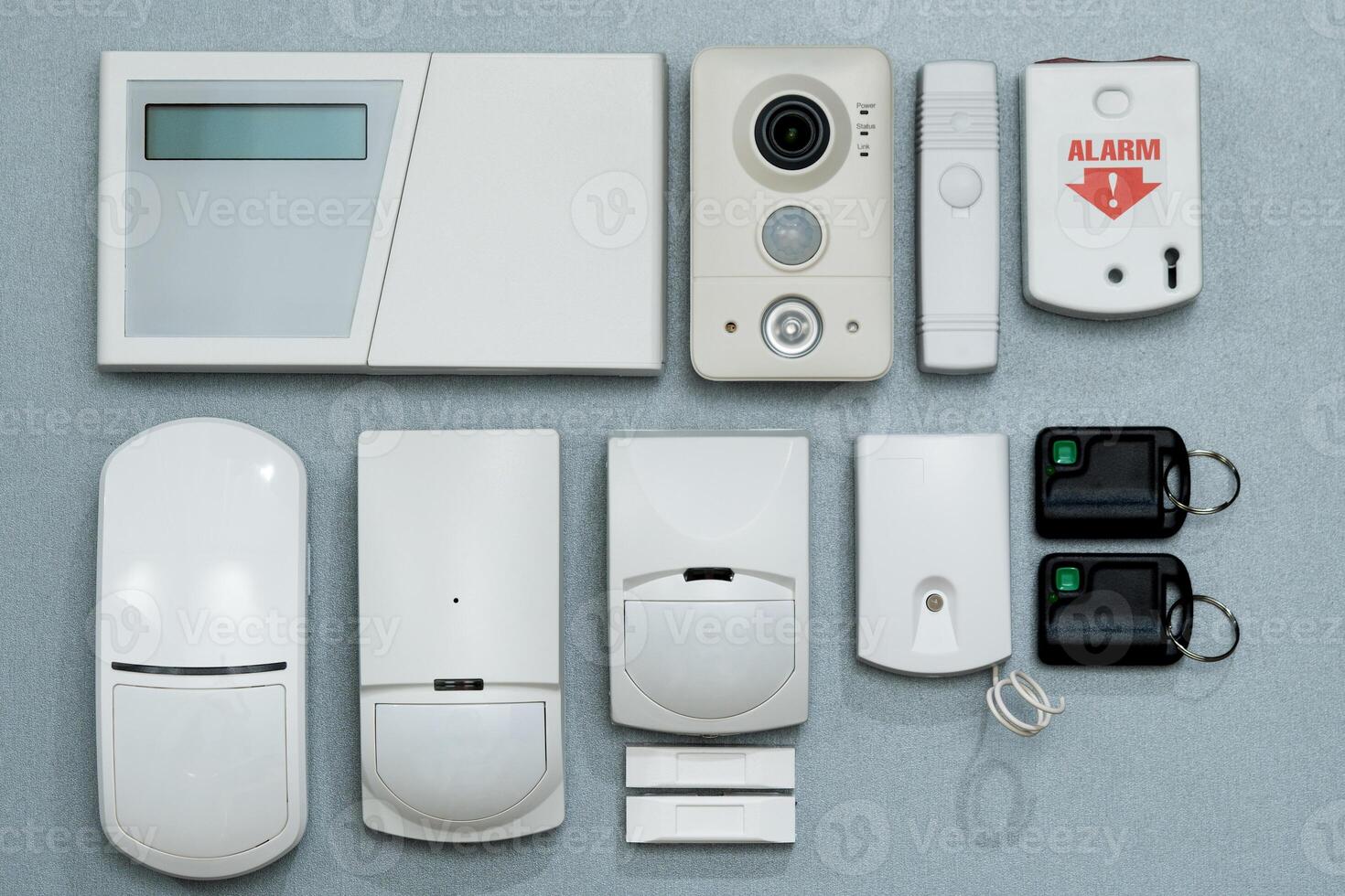 set of security systems for the house on a gray background close-up. photo