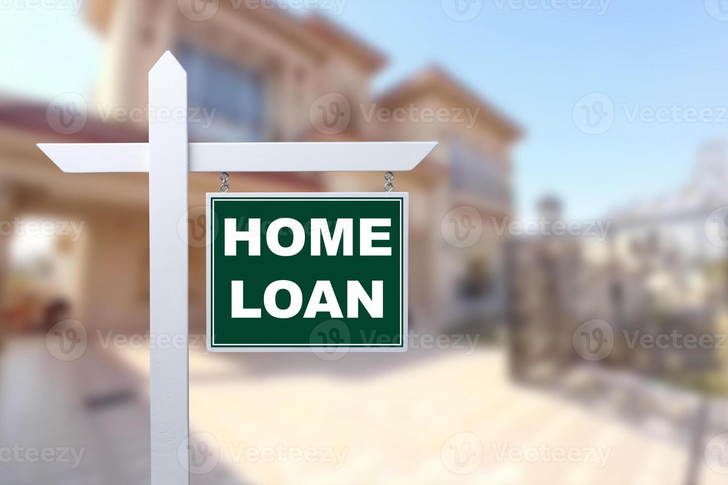 HOME LOAN sign against a house. Close-up. photo