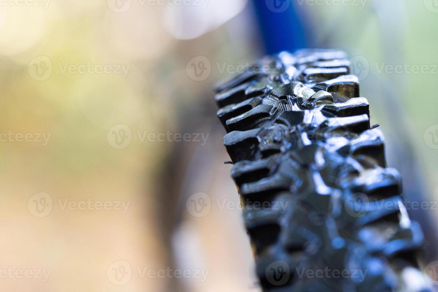 Aggressive bicycle off-road rubber tread close-up. photo