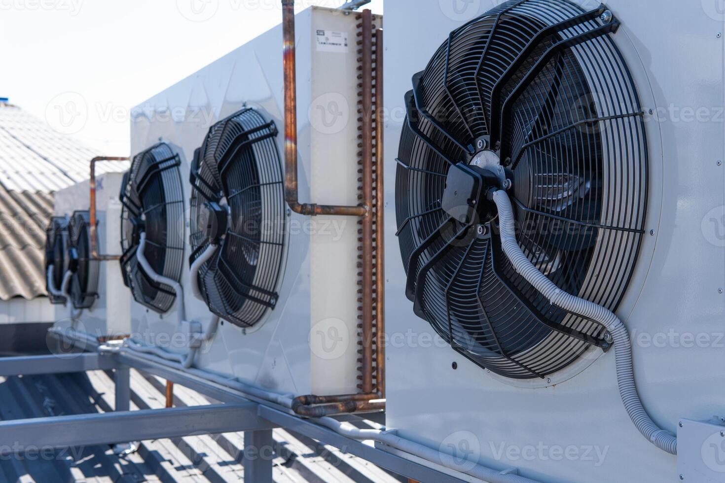 The air conditioning system is assembled on the side of the building. photo