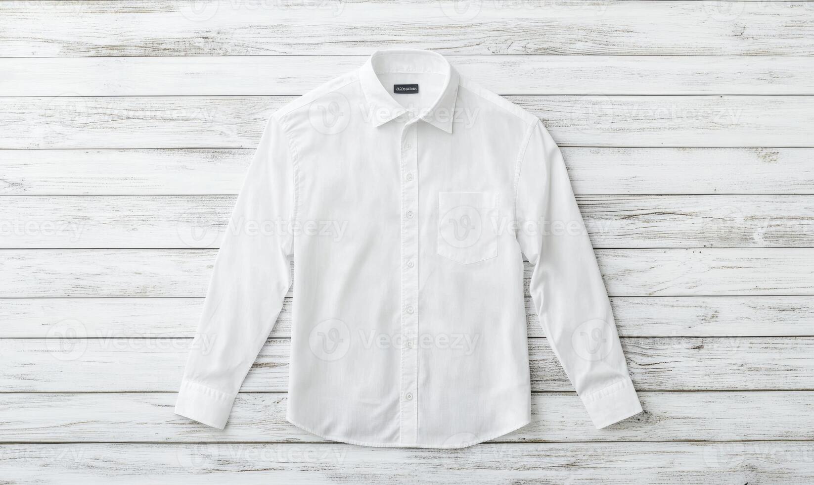 A white shirt with a pocket and a collar photo