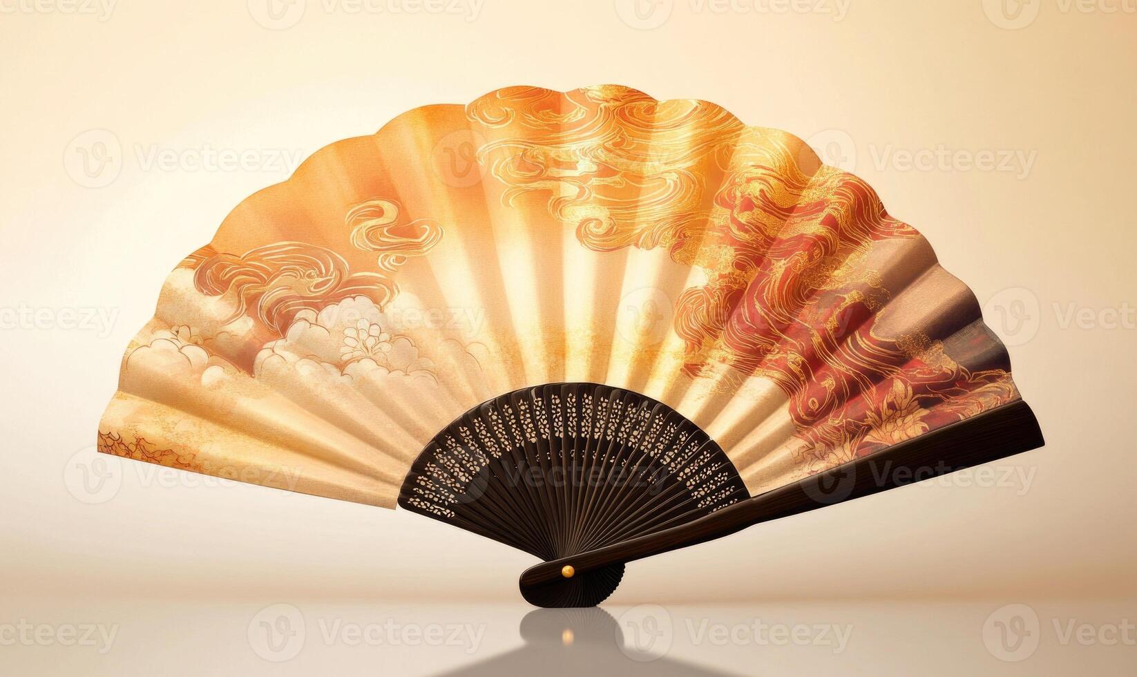 A large fan with a gold and red design is sitting on a white surface photo