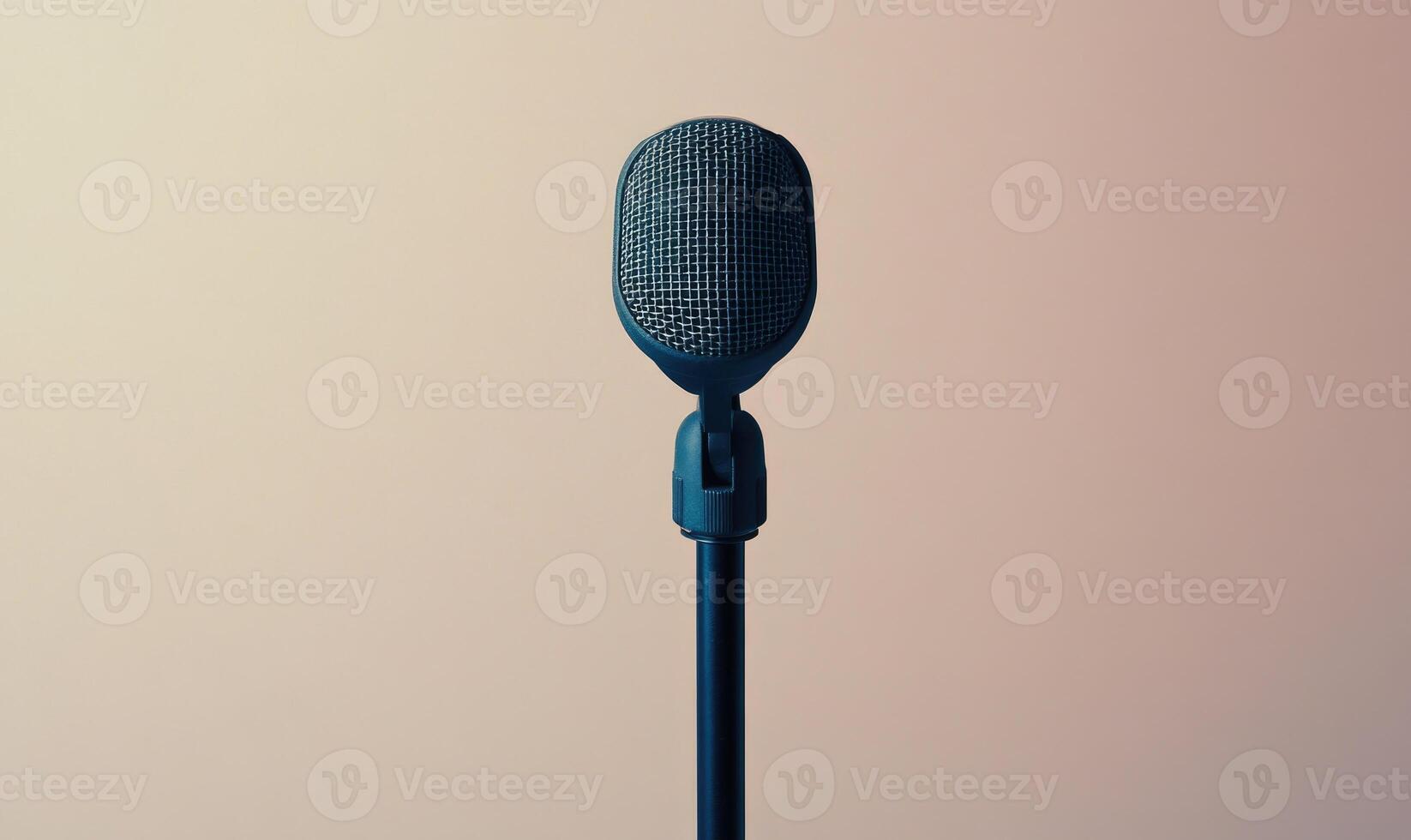 A microphone is standing upright on a white background photo