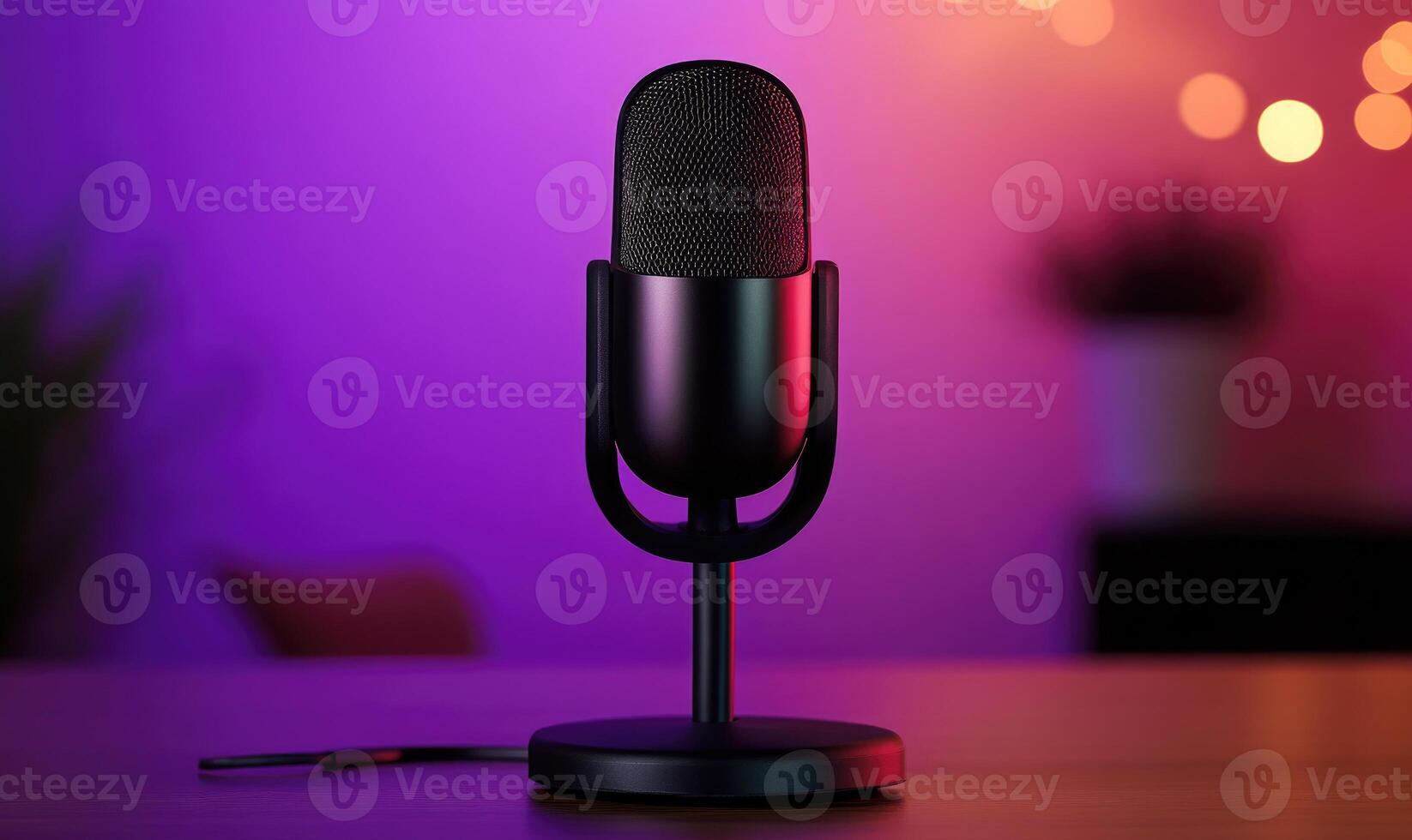 A microphone is on a table in front of a purple background photo