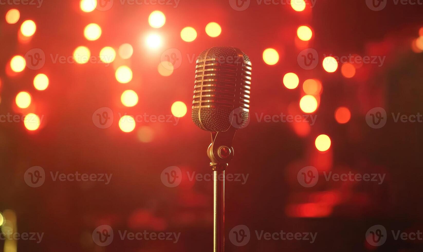 a microphone is in front of a red light photo