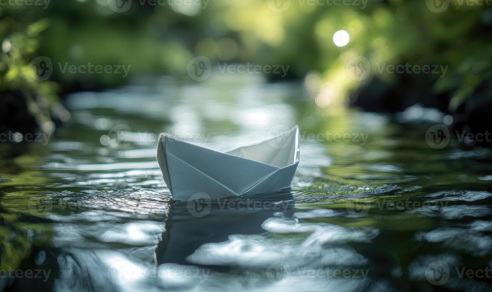 paper boat floating in water with trees in background photo