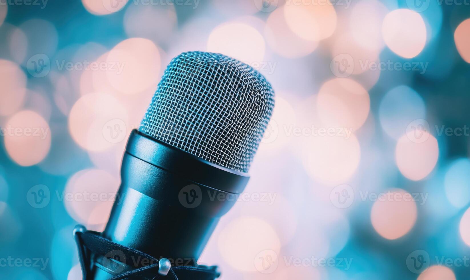closeup view of a microphone is pointed at a blurry background photo