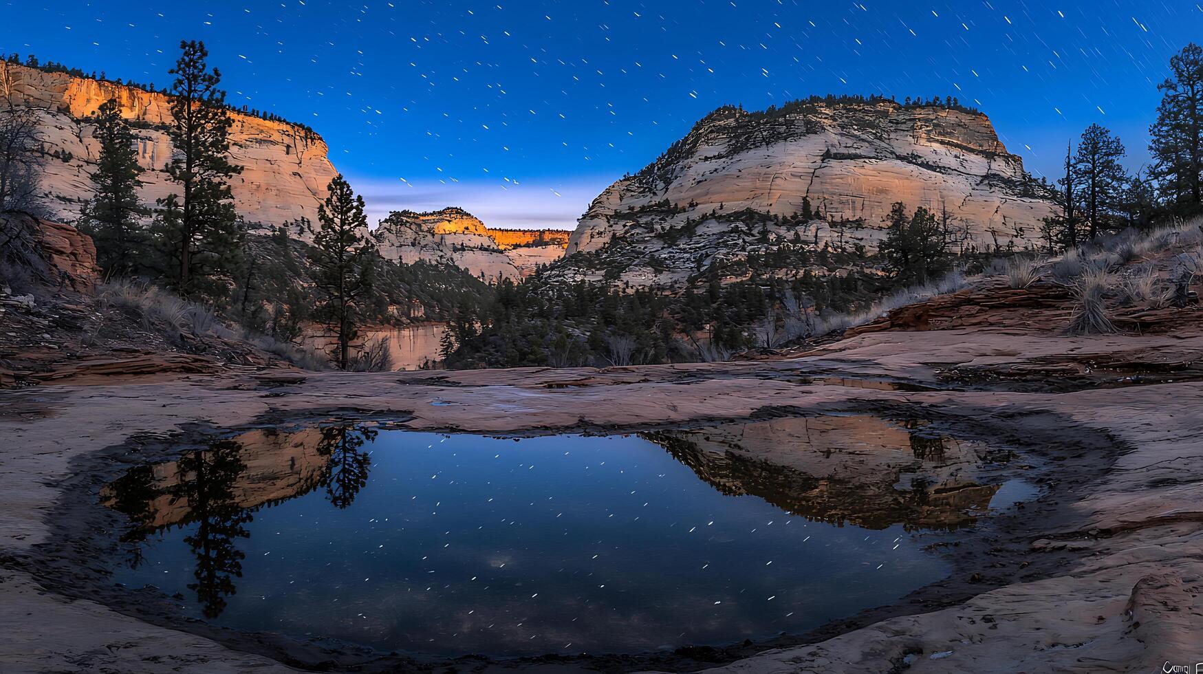 Starry Night Reflection in Zion National Park Canyon. A serene landscape photograph showcasing the night sky reflected in a tranquil pool of water amidst towering sandstone cliffs. photo