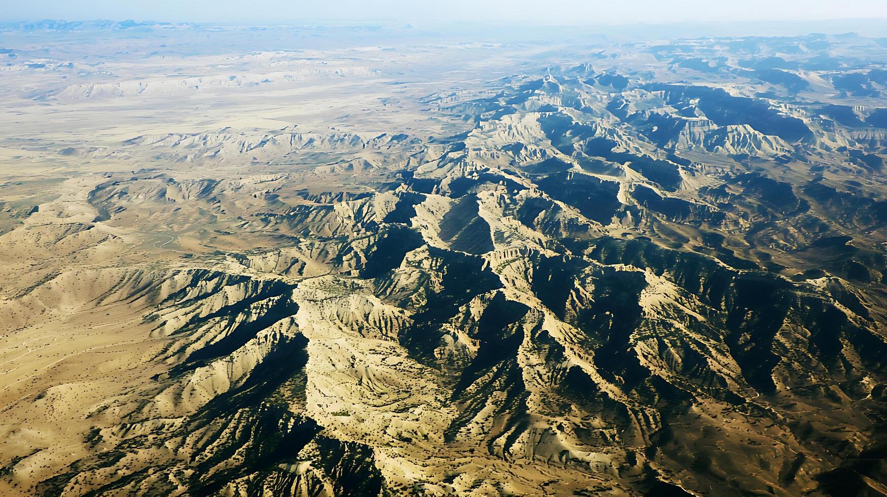Aerial View of a Dramatic Mountain Range, Desert Landscape. photo