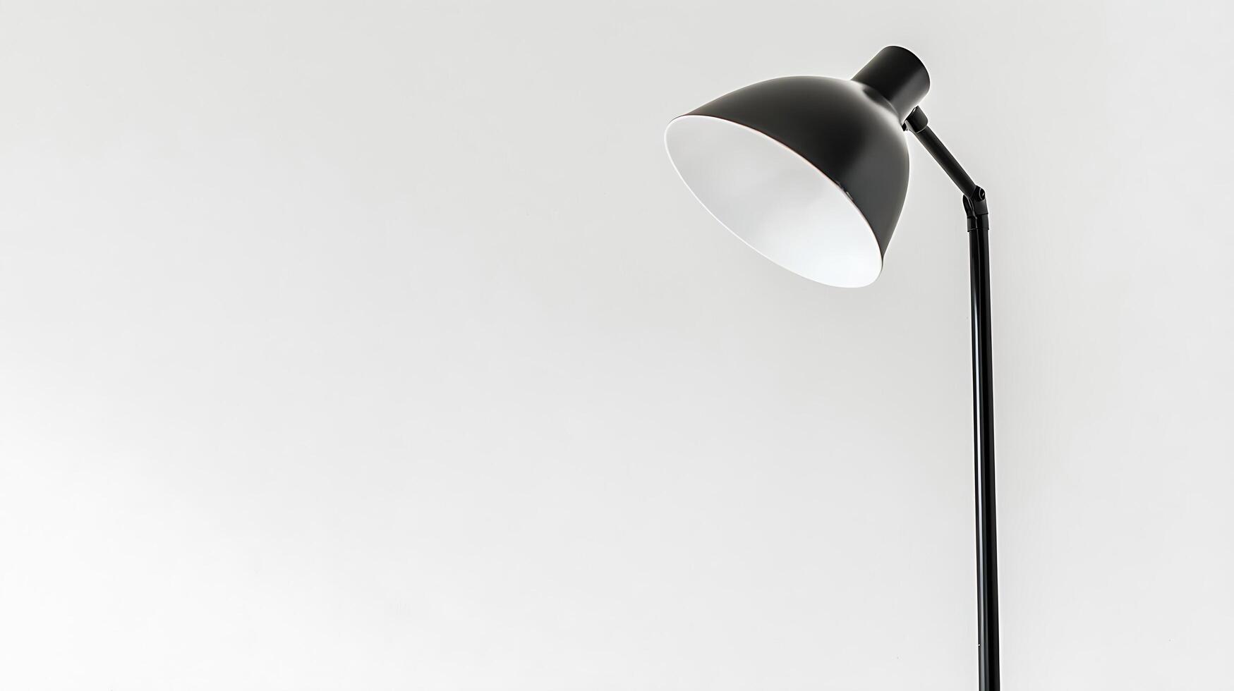 Modern Black Floor Lamp Against White Wall Simple Interior Design Element. photo