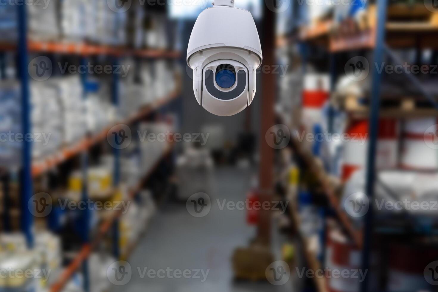 CCTV Camera Operating inside warehouse or factory. photo
