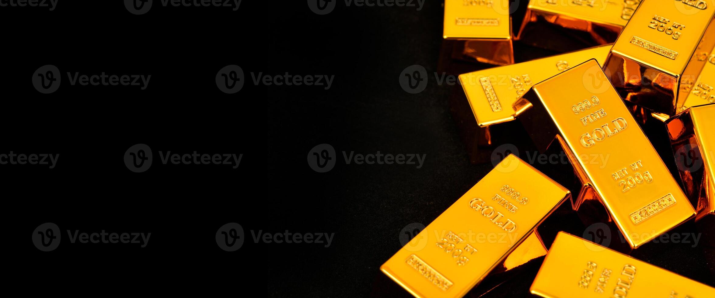 gold bars on black background photo