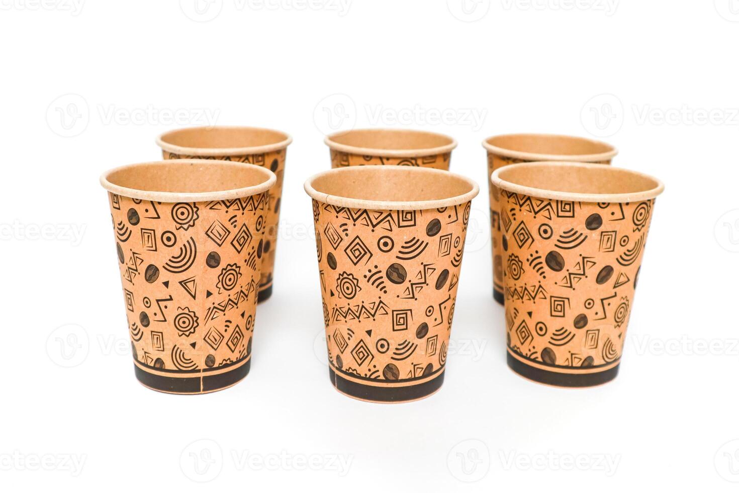 A Set of Patterned Paper Cups on a White Background, Perfect for Serving Coffee or Tea photo