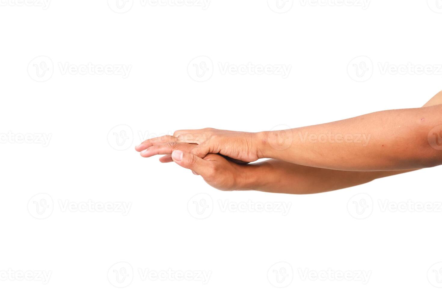 Close-up of two human hands intertwined on a white background, showing care and connection, in studio shot photo