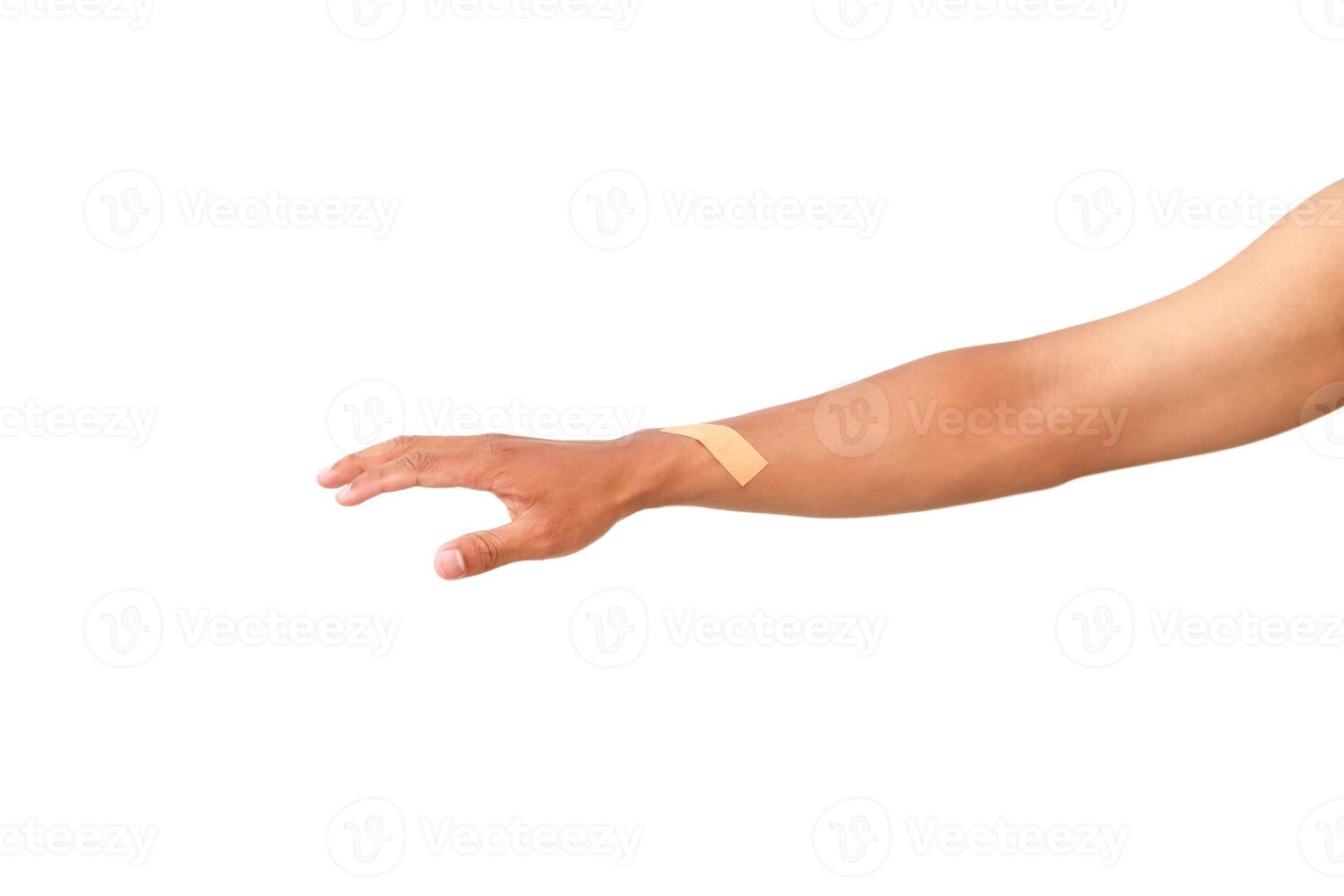 Arm with adhesive bandage isolated on white background represents injury care and recovery photo