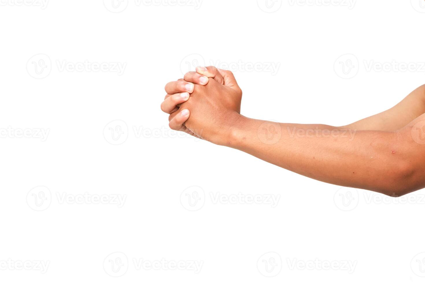 Hands clasped in anticipation or prayer on a white background conveying hope and faith photo