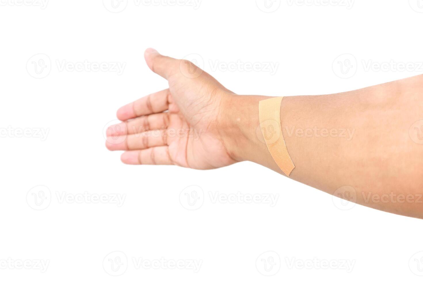 Hand outstretched with a bandage on wrist, medical care and injury protection for health and well being photo