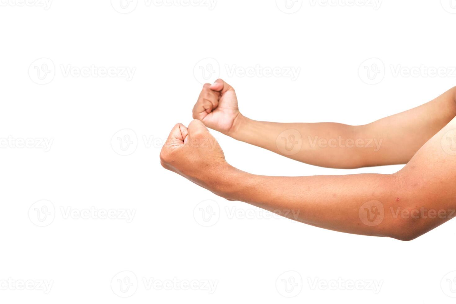 Isolated clenched fists, embodying strength, determination, and unwavering resolve on pure white background photo