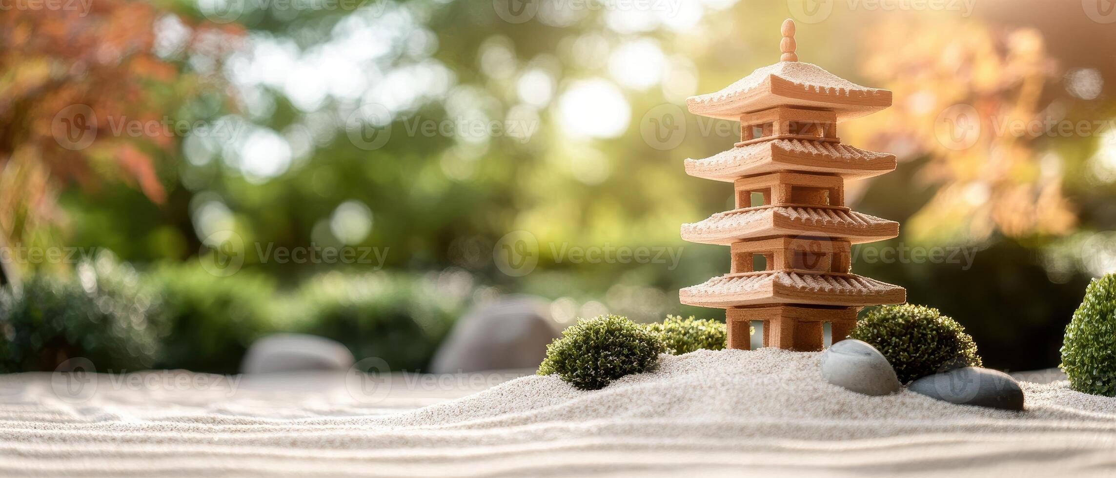 Miniature Tower Decoration Stands on Sand With Bushes Rocks at Sunrise. Serene Garden scene, Gardening photo