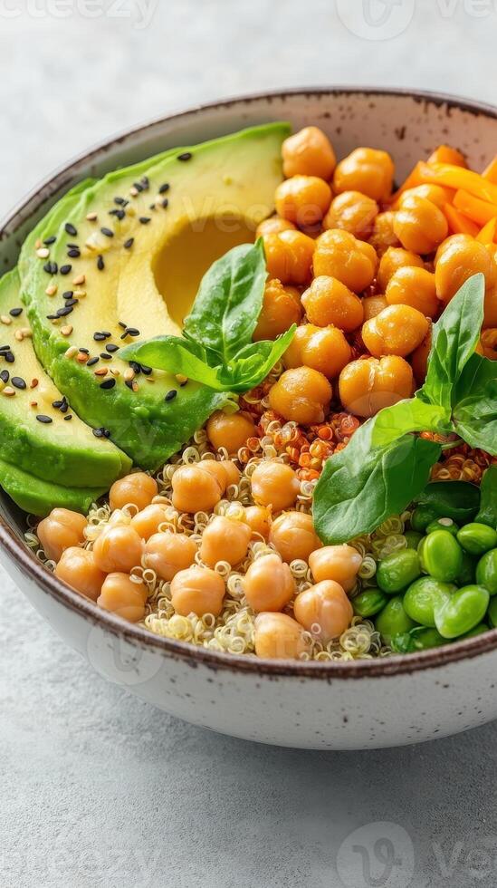 Bowl Filled with Quinoa, Chickpeas, Avocado, Edamame, and Basil, Balanced Meal for Health, Ideal for Fitness and Wellbeing photo