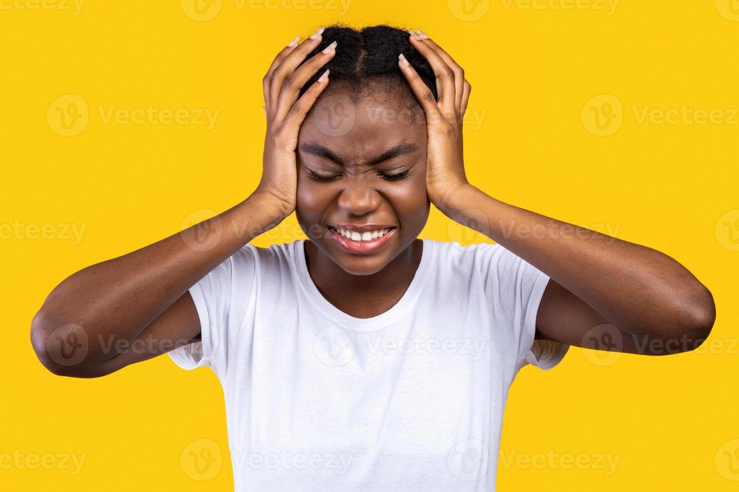 Headache. Black Young Lady Touching Aching Head Suffering From Pain And Severe Migraine Standing Posing Over Yellow Studio Background, With Eyes Closed. Painful Headaches, Health Problem photo