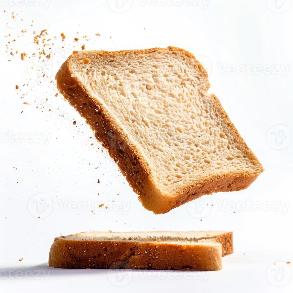 A slice of bread is being thrown into the air photo