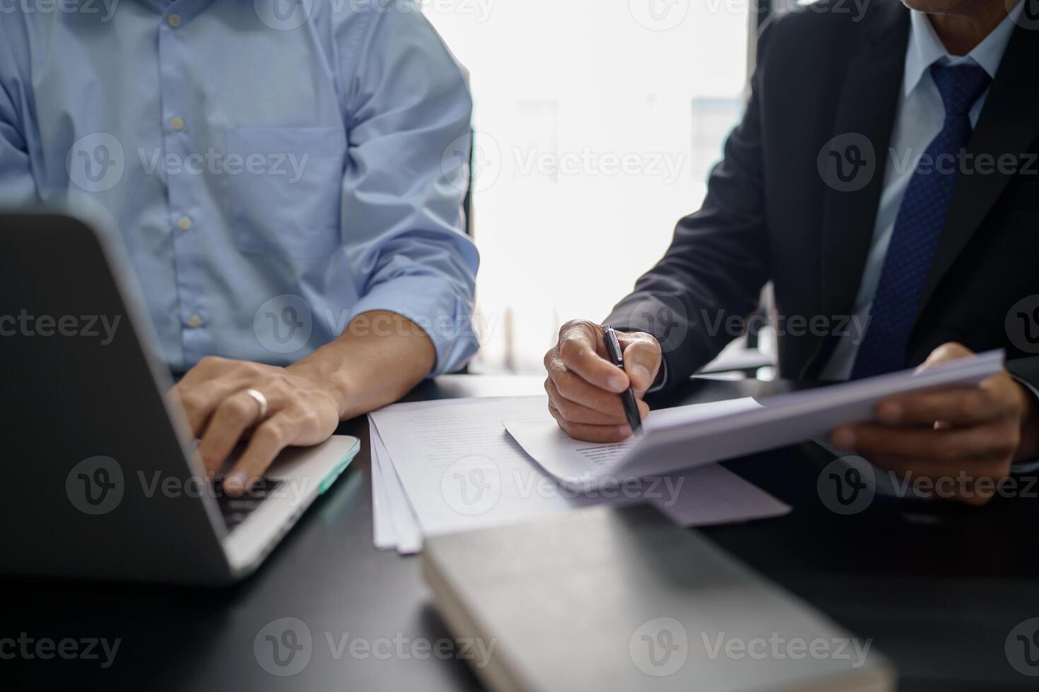 Lawyer Legal counsel presents to the client a signed contract with gavel and legal law, justice and lawyer Business partnership meeting. photo
