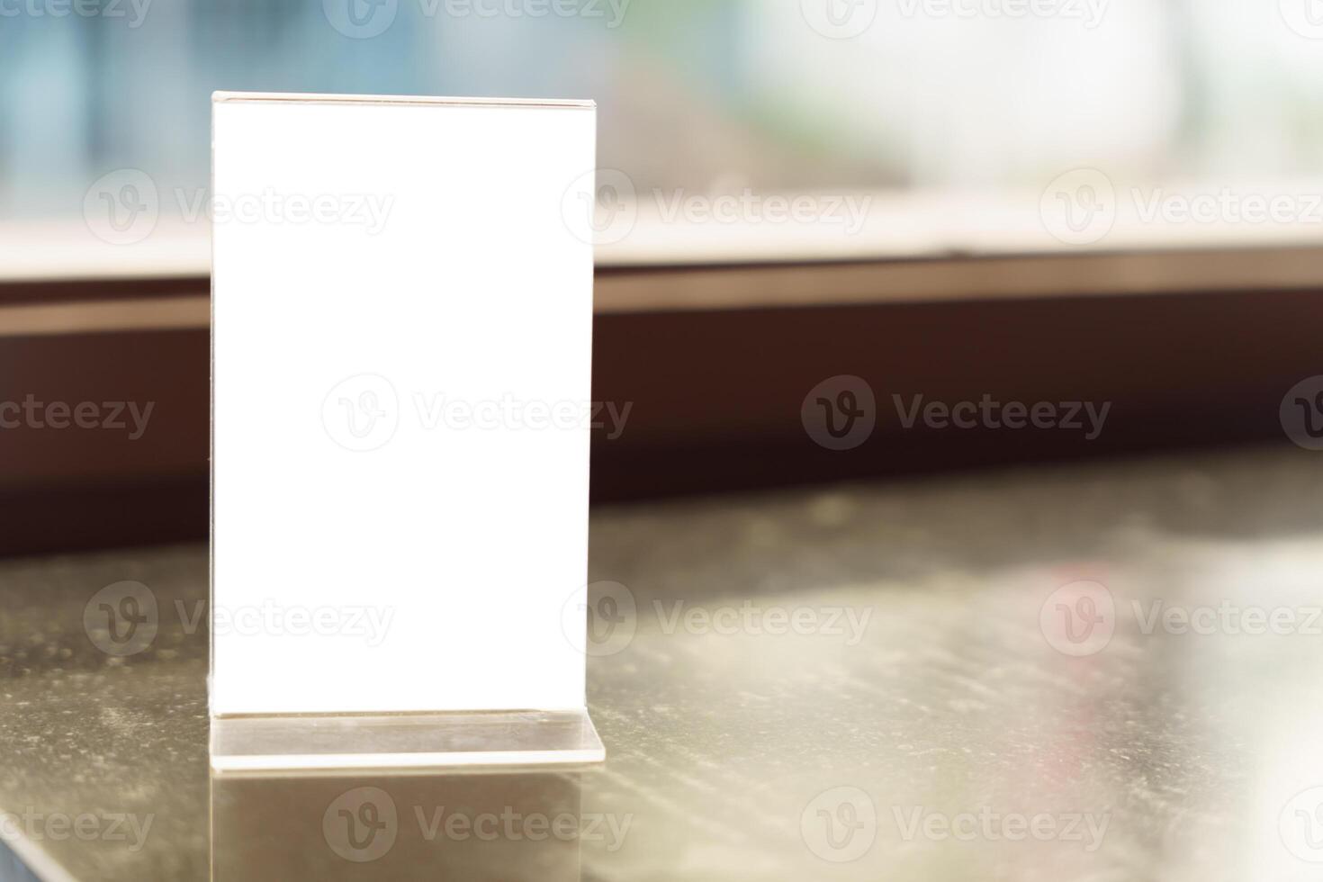 Menu mock up. blank for text marketing promotion. Mock up Menu frame standing on wood table in restaurant space for text photo