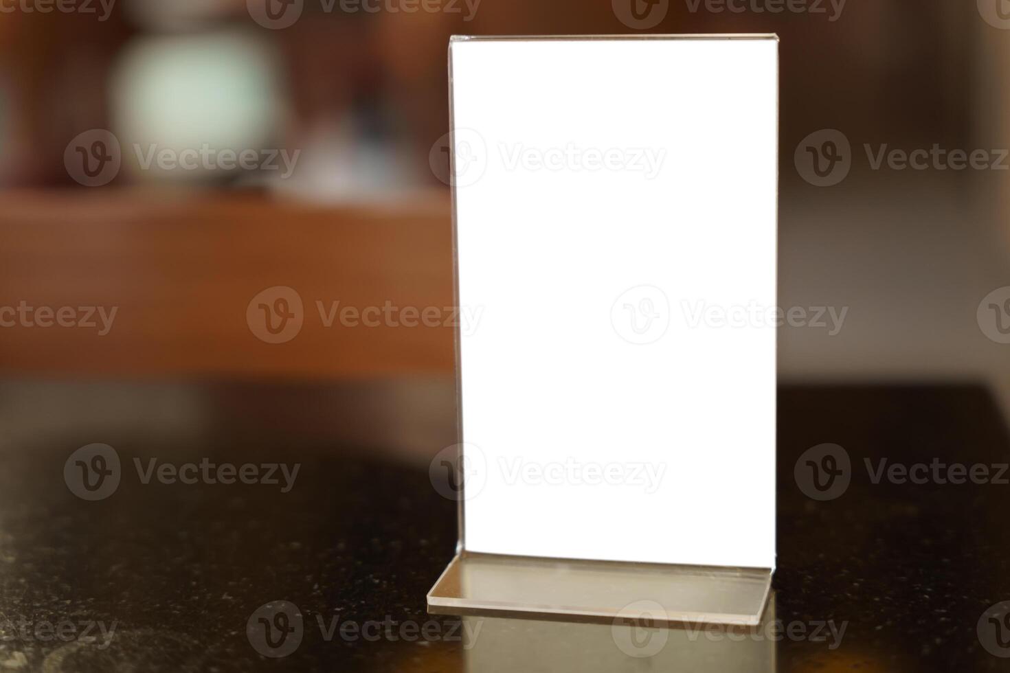 blank white menu on a table in a restaurant photo